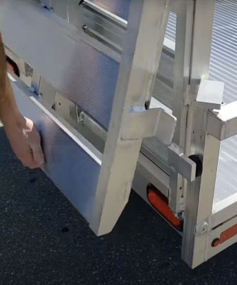 Bi-Fold Ramp Auto Latch System on trailer