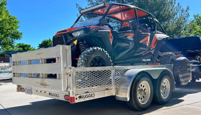 Polaris Ranger on 6.5 × 14 open trailer