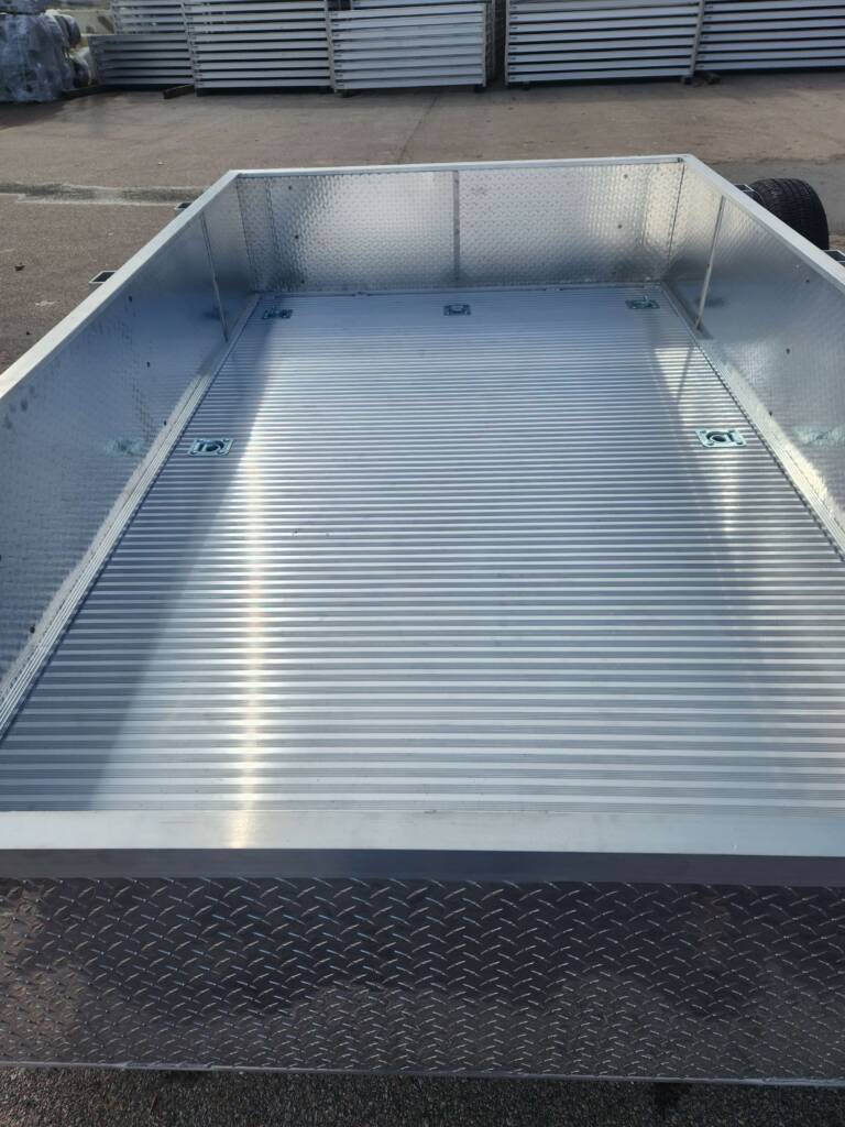 POPULAR BUILD 6.5' X 12' dual axle aluminum trailer with 21" rail and tread plate