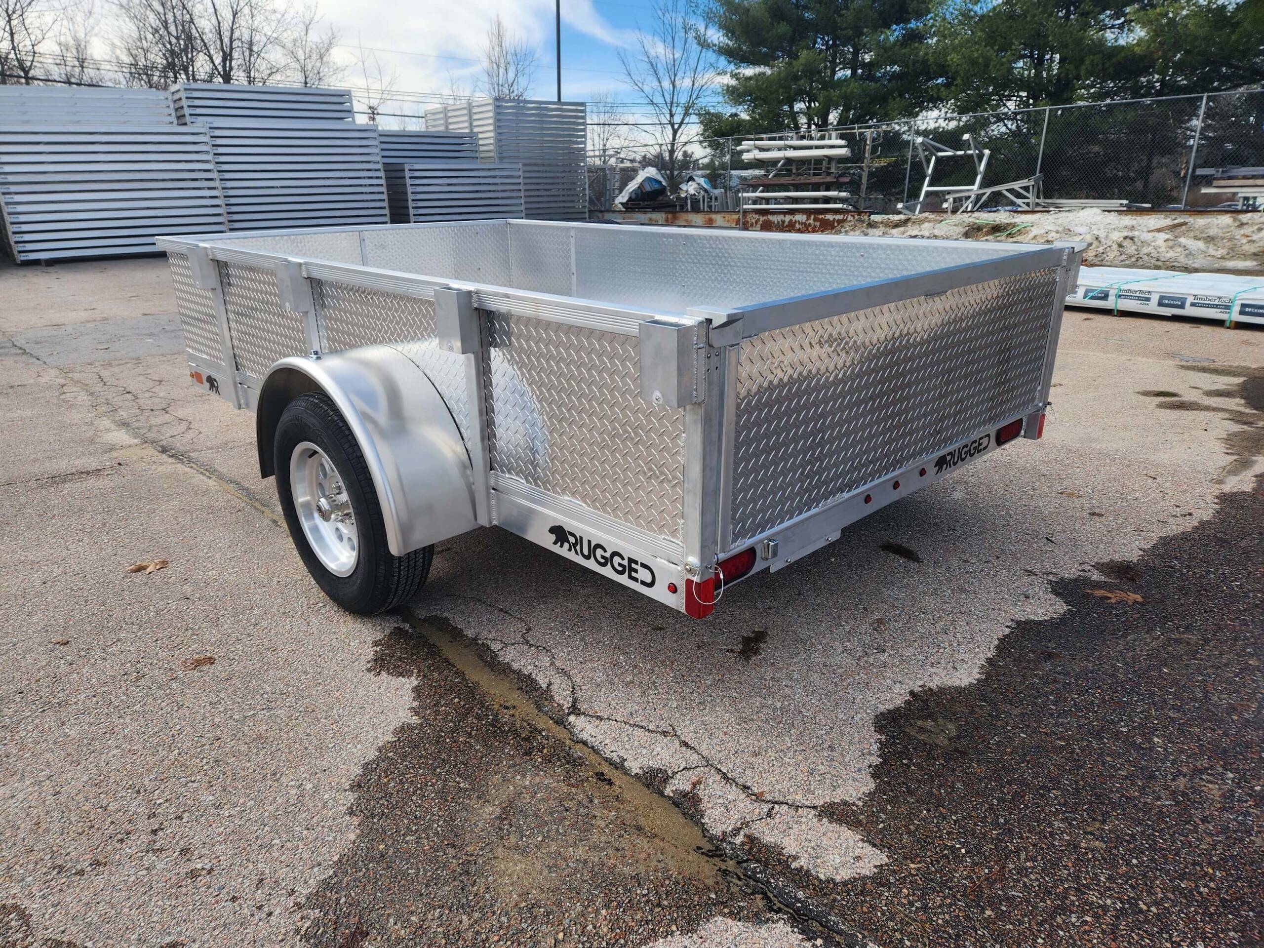 POPULAR BUILD 6' x 10' single axle aluminum trailer with 21 rail and tread plate